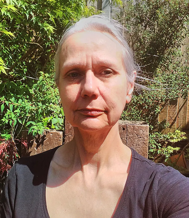 Joanna in casual outdoor selfie, garden setting, natural everyday look