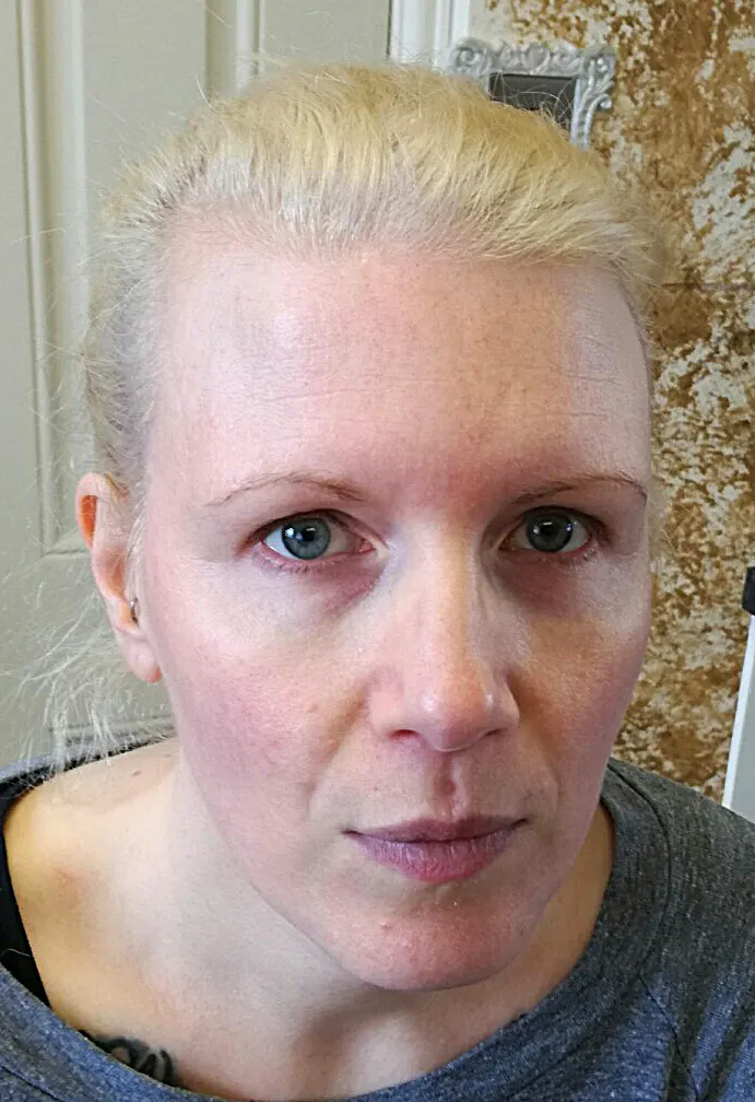 Melissa in casual selfie with blonde hair, plain everyday appearance